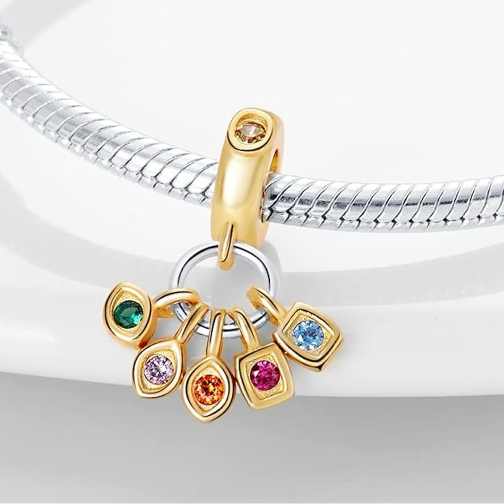 Elegant Gold and Silver Charm Bracelet
